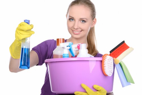 Staff member wearing PPE during an Ilford cleaning task